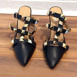 Black and gold heels